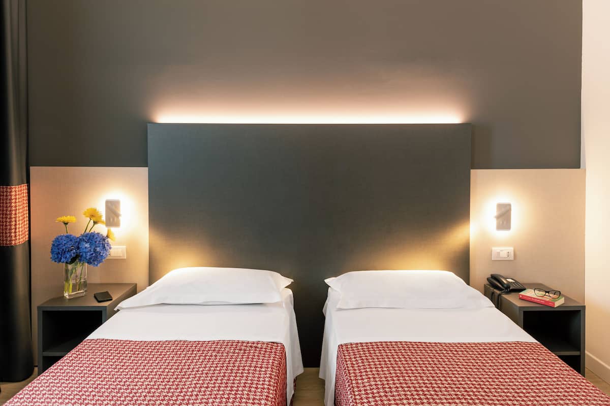 superior double or twin room | down duvets, minibar, in-room safe, desk