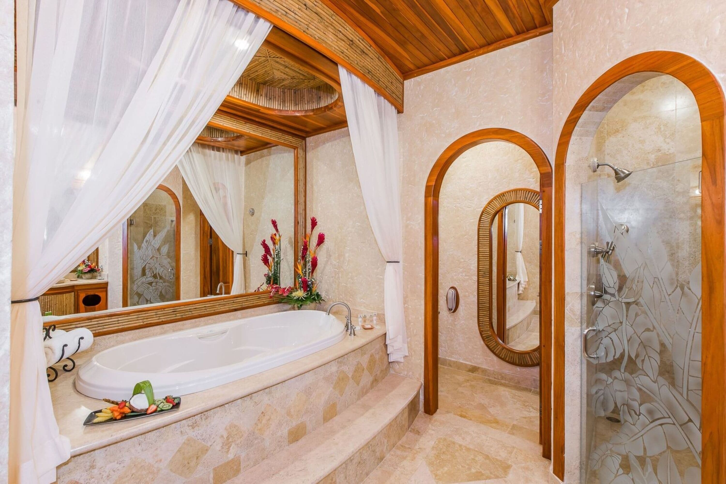 vista grande guest room | bathroom | separate bathtub and shower, jetted bath, designer toiletries