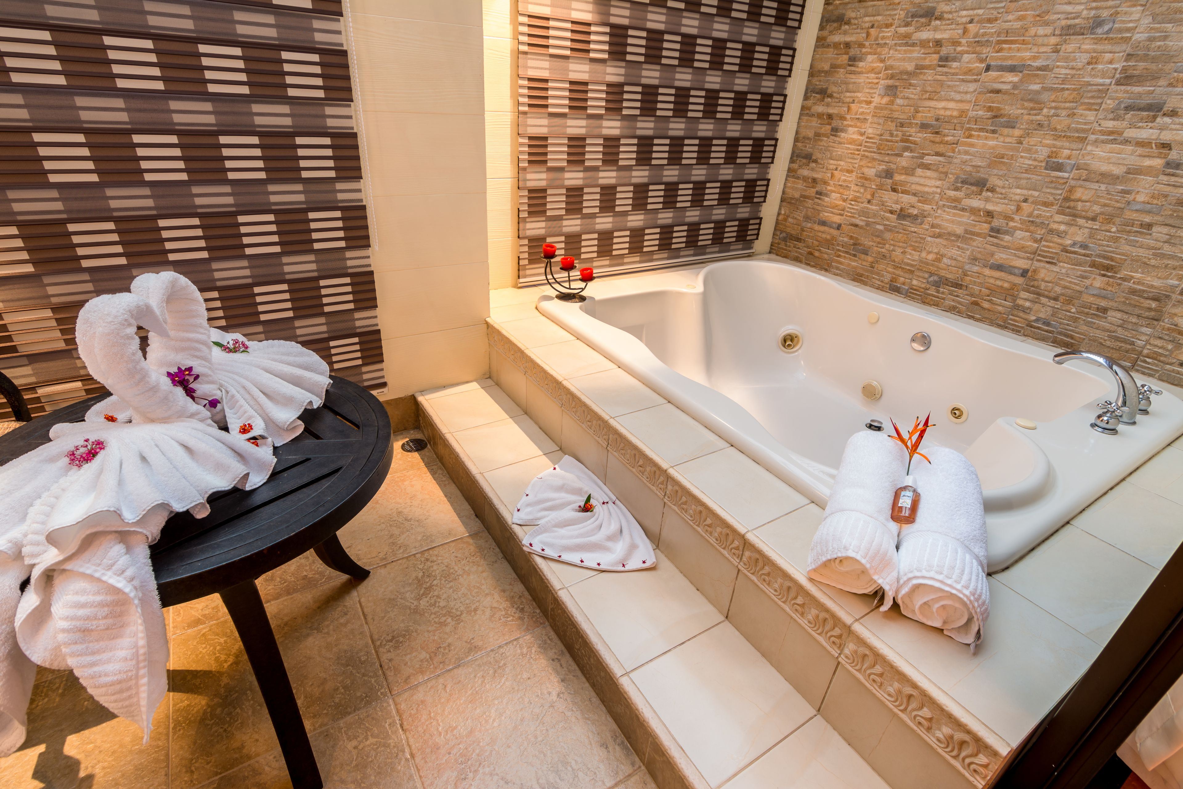 romantic villa, jetted tub | bathroom | shower, hair dryer, bathrobes, towels