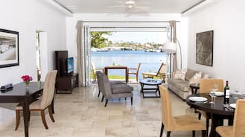 Luxury House, 1 King Bed, Kitchen, Marina View | Living area | 50-inch flat-screen TV with satellite channels, TV, books