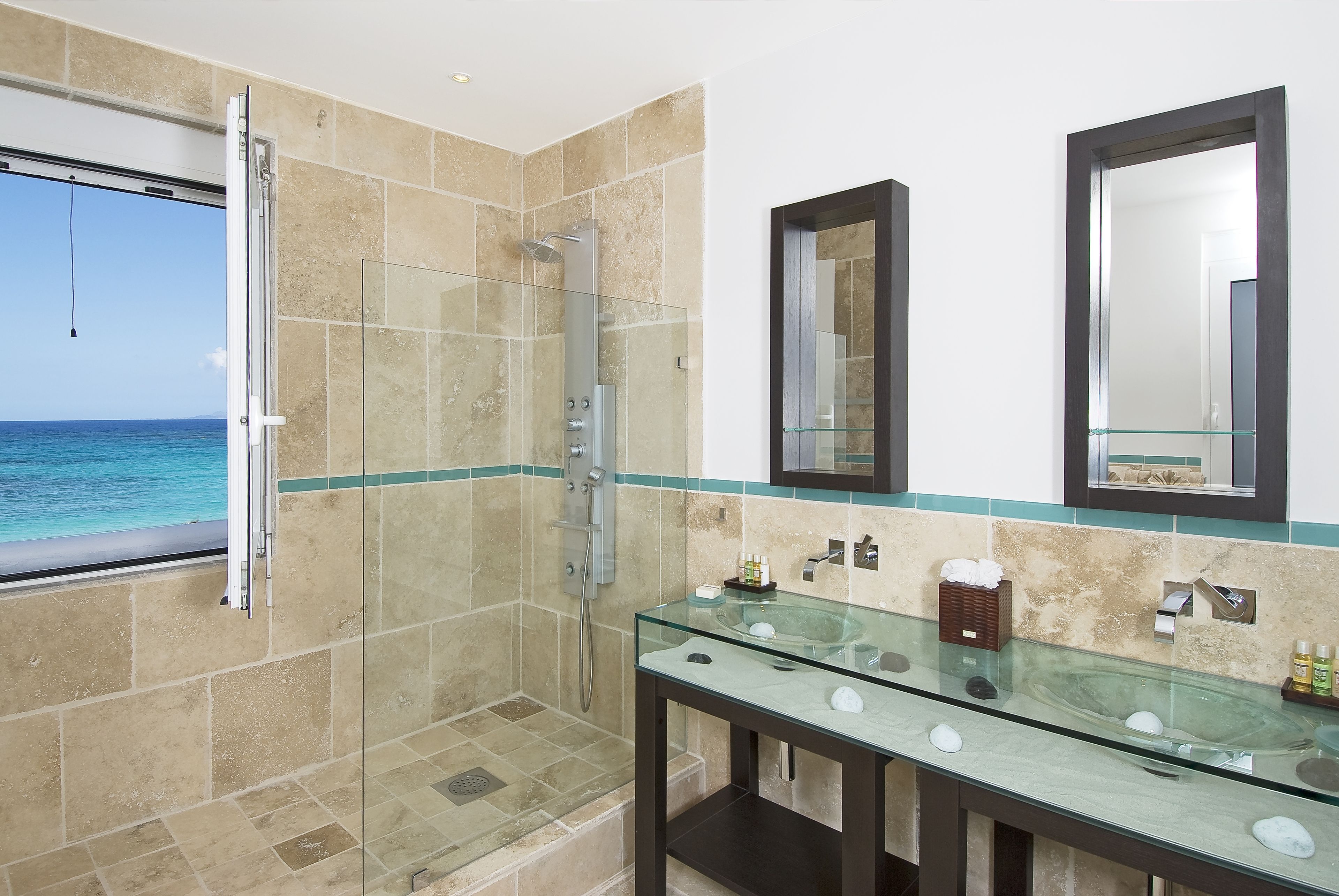 deep-soaking bathtub, designer toiletries, hair dryer, bathrobes