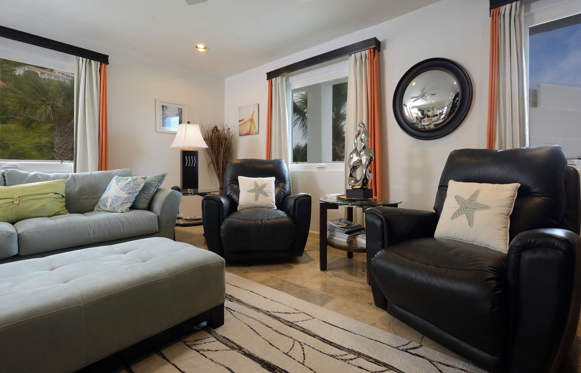 condo, 1 king bed with sofa bed, lagoon view | living area | 50-inch flat-screen tv with satellite channels, tv, books