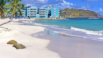 On the beach, sun-loungers, beach umbrellas, beach towels