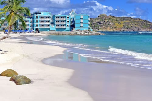 On the beach, sun loungers, beach umbrellas, beach towels