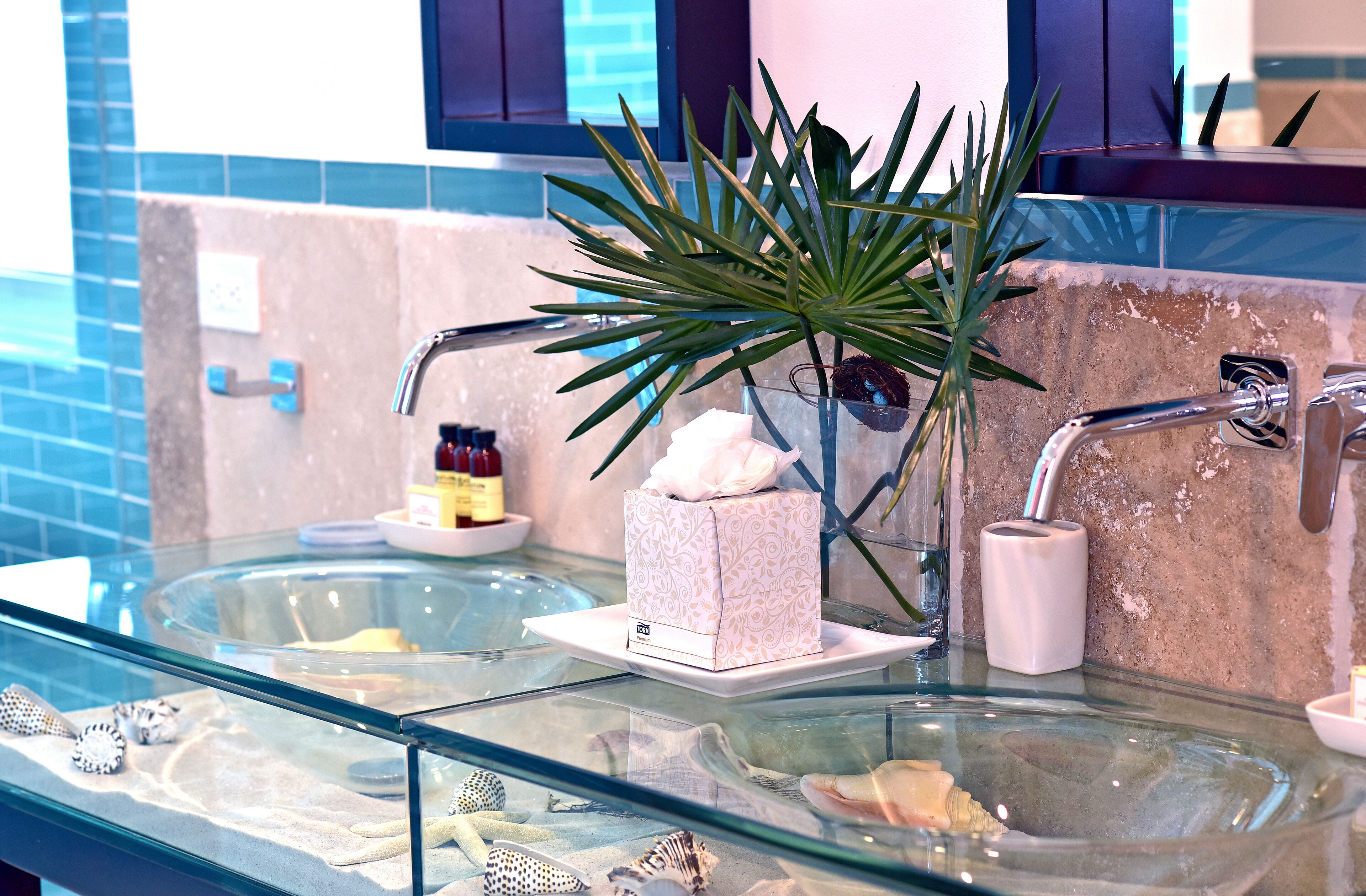 deep-soaking bathtub, designer toiletries, hair dryer, bathrobes