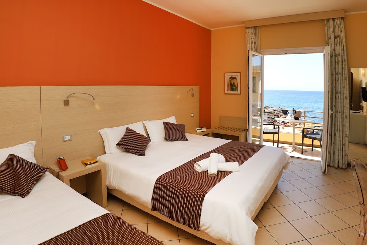 panoramic triple room, balcony, sea view | 1 bedroom, minibar, desk, soundproofing