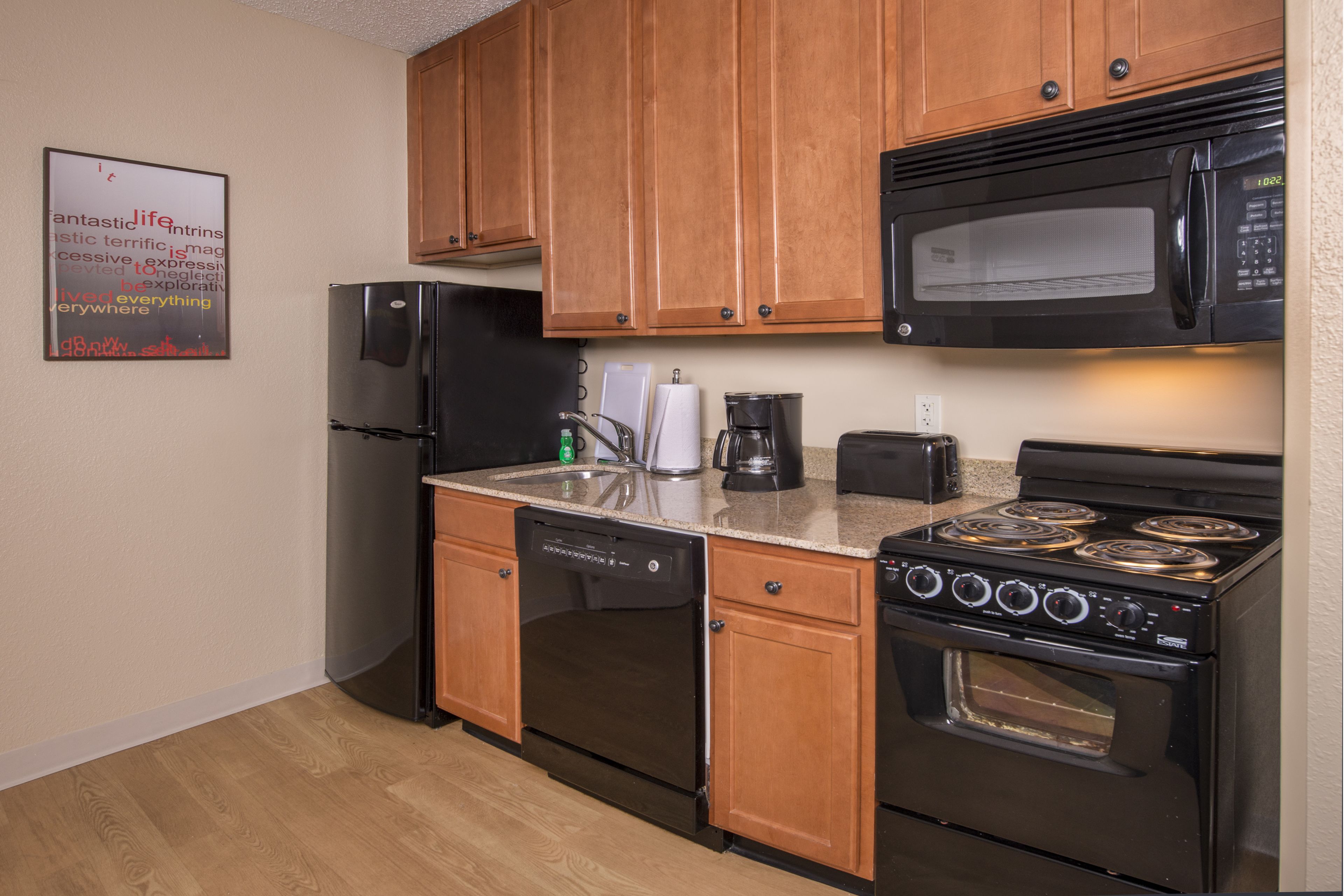 full-sized fridge, microwave, dishwasher, coffee/tea maker