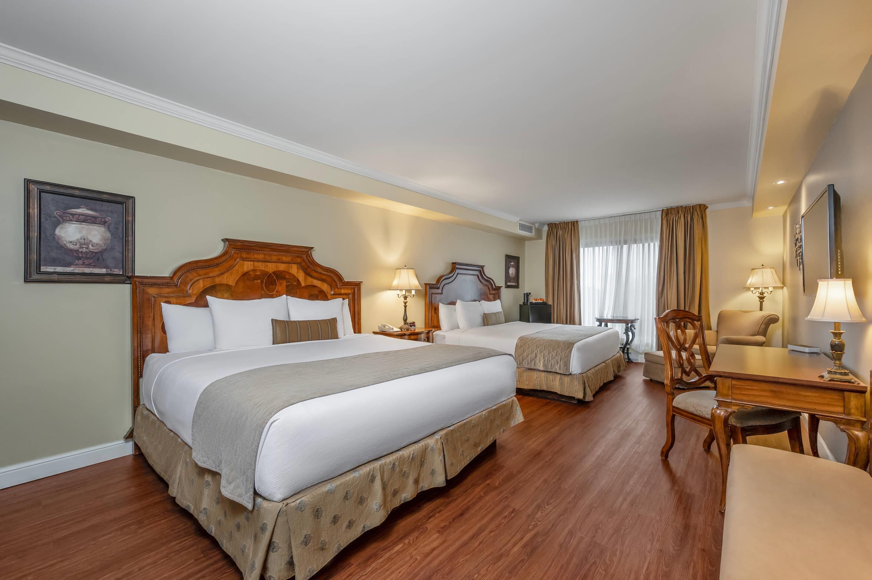 Standard Room, Multiple Beds, Non Smoking | Hypo-allergenic bedding, down duvets, desk, laptop workspace