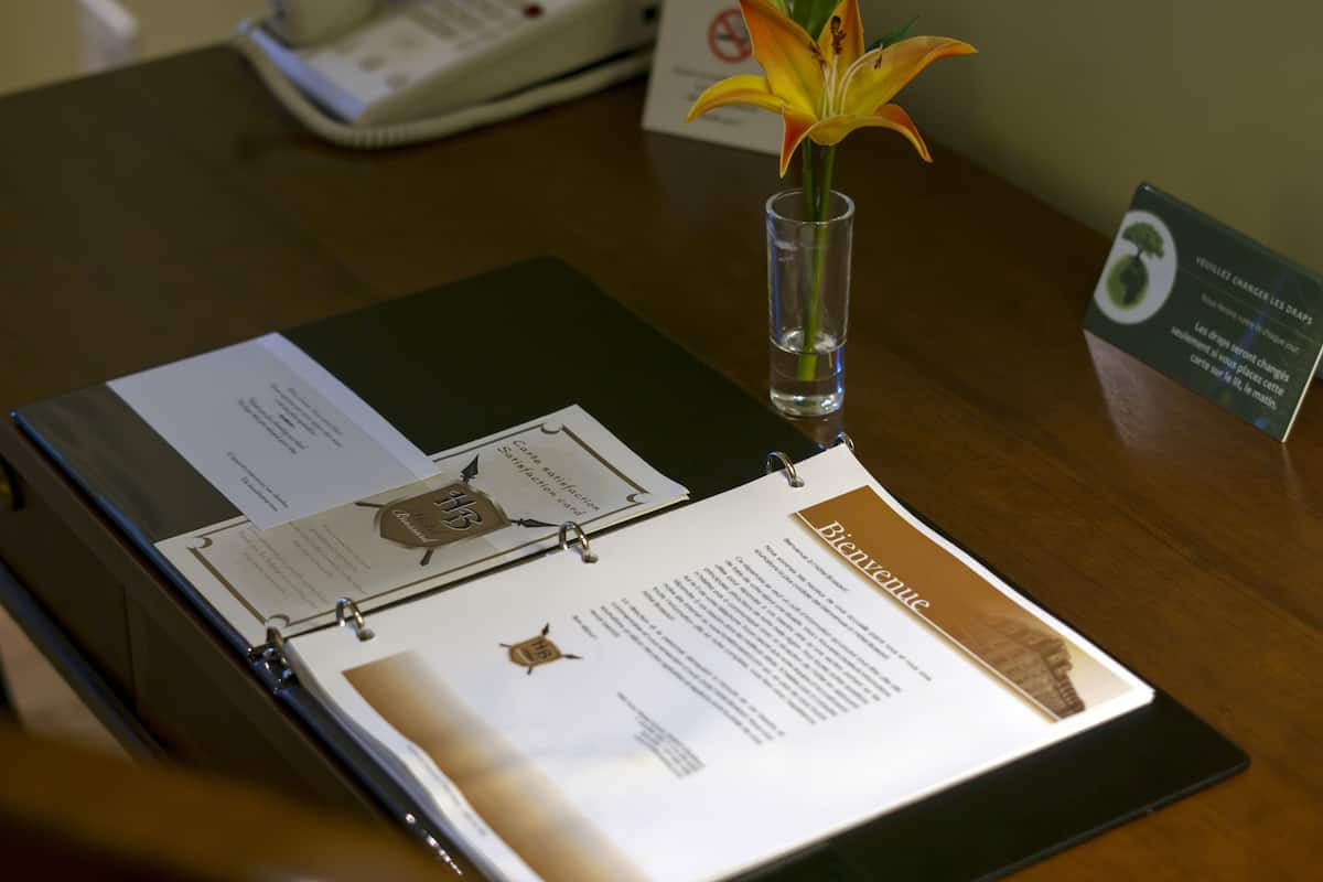 Hypo-allergenic bedding, down comforters, desk, laptop workspace