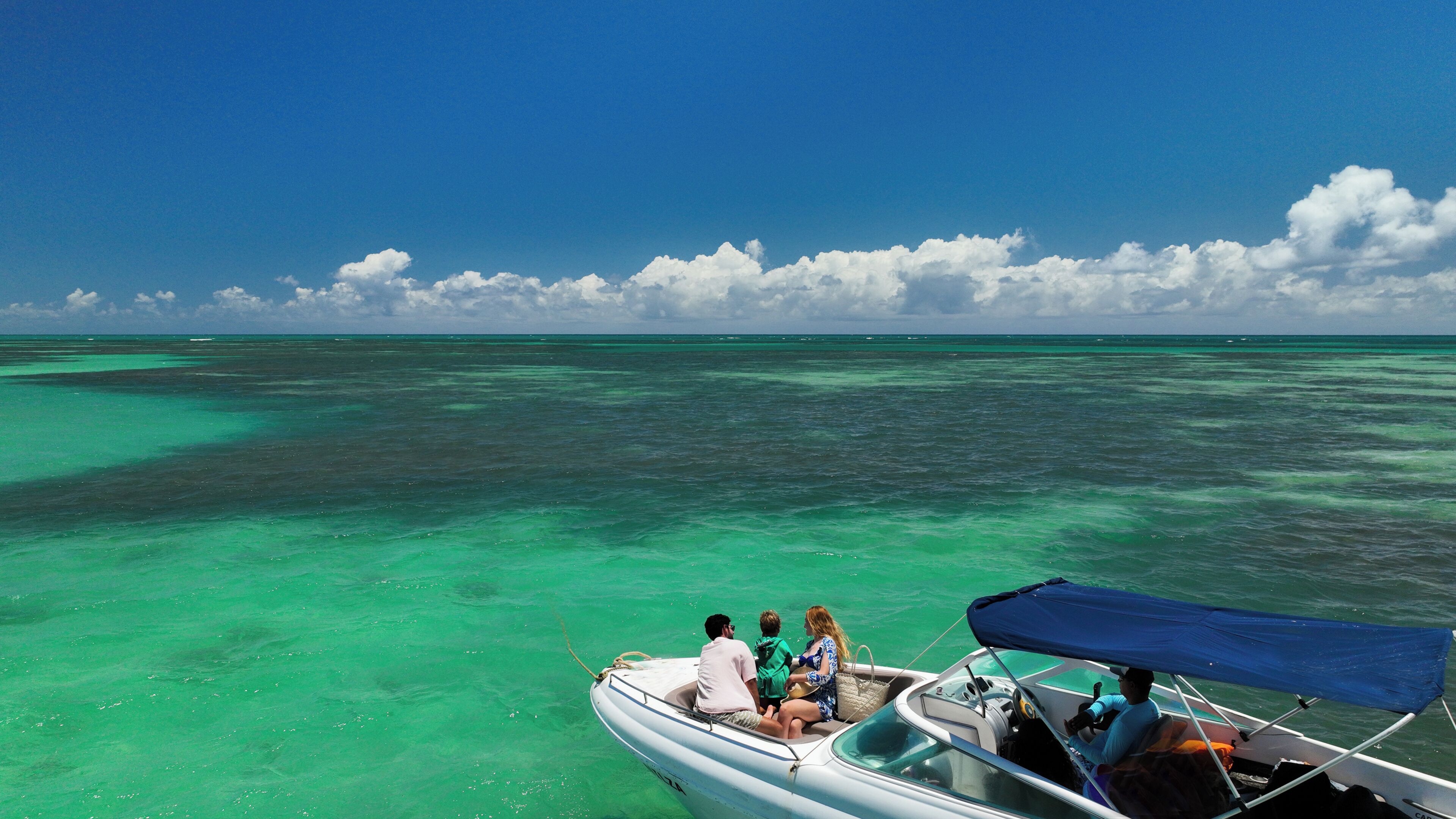 On the beach, white sand, free beach cabanas, sun loungers