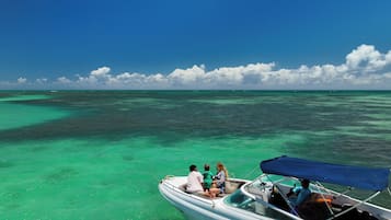 On the beach, white sand, free beach cabanas, sun loungers