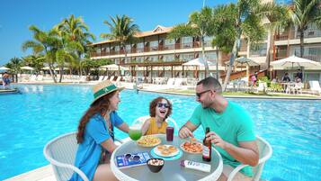 Outdoor pool, open 7:00 AM to 8:00 PM, pool umbrellas, pool loungers