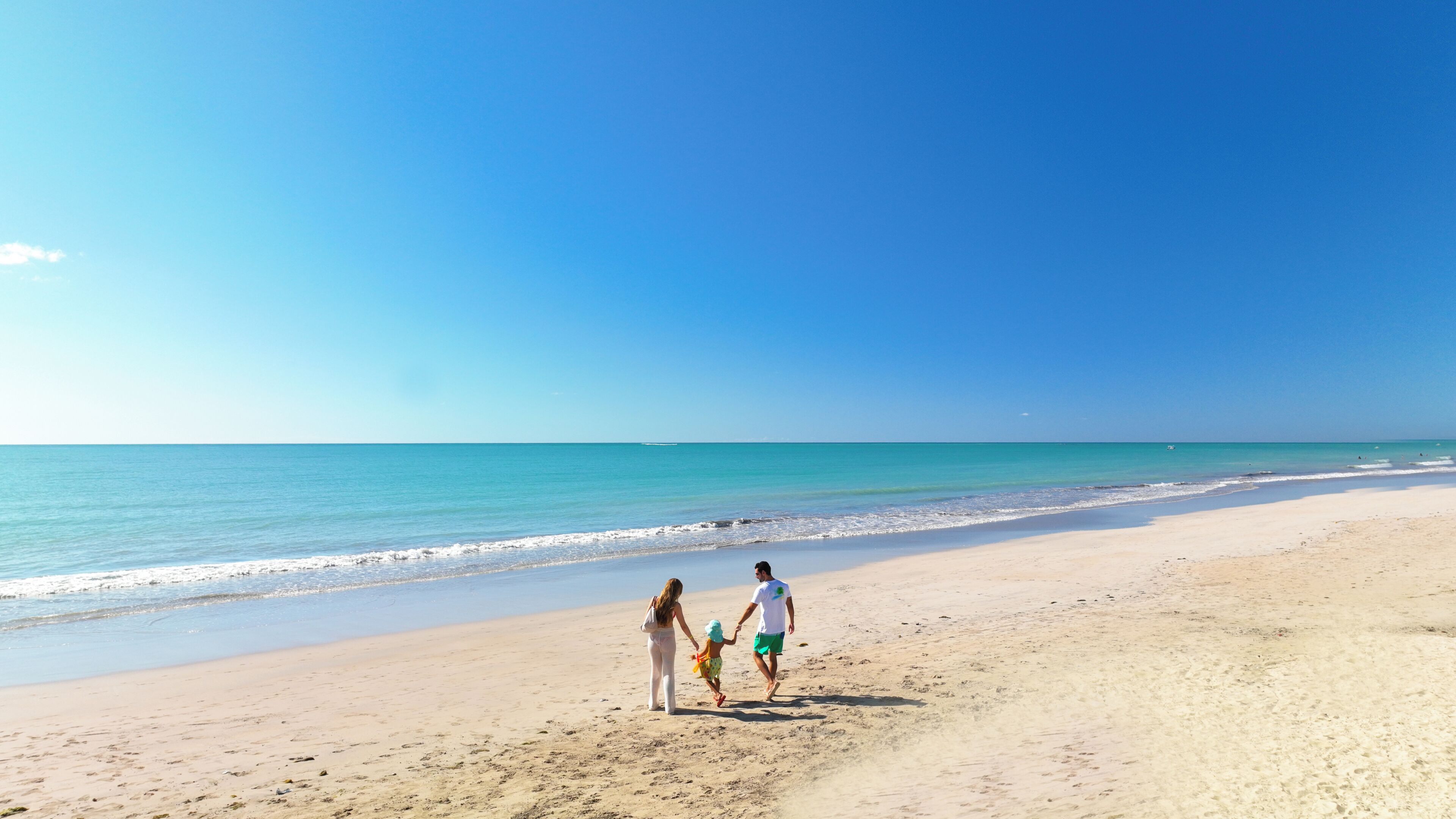 On the beach, white sand, free beach cabanas, sun loungers