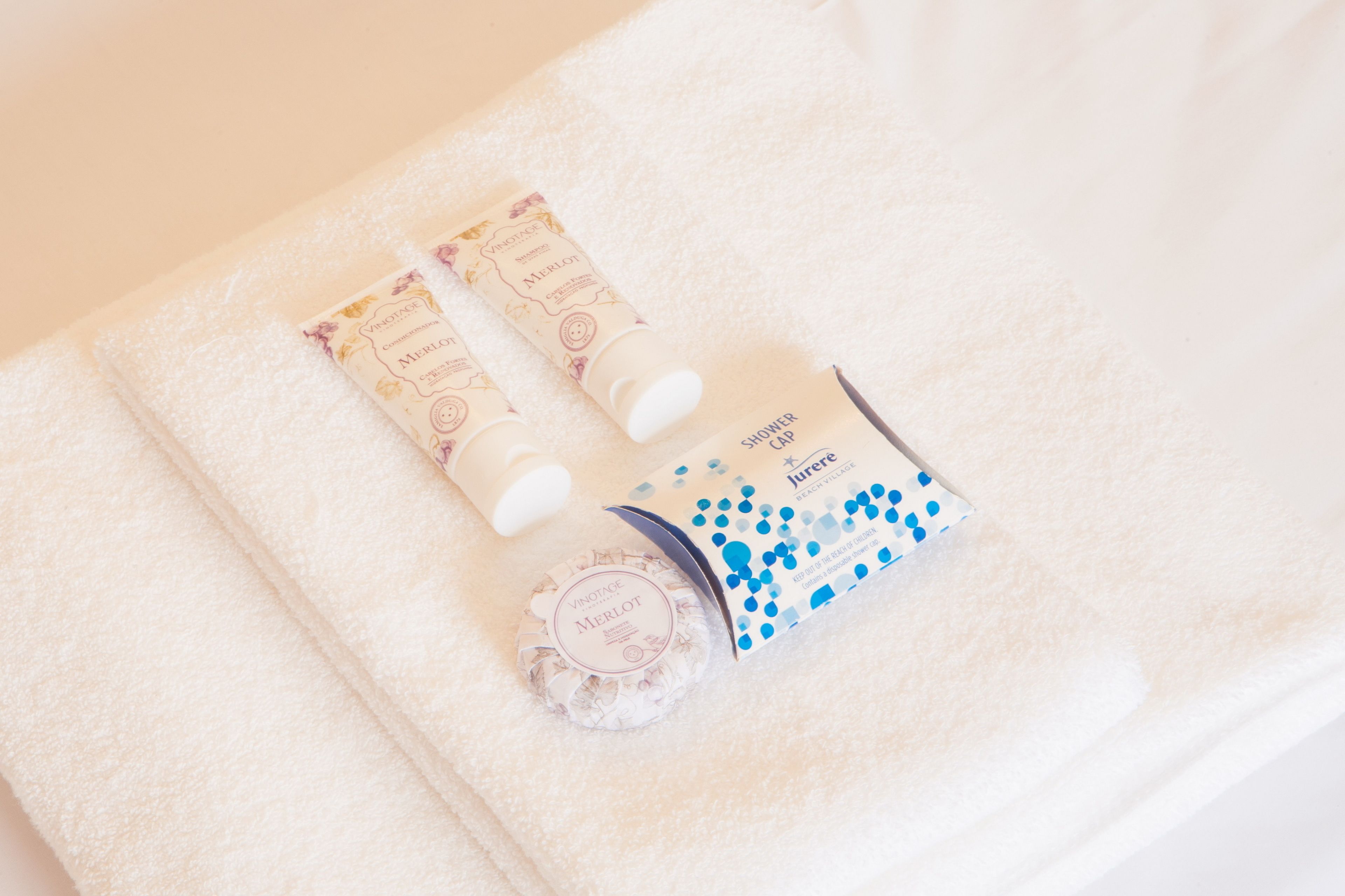 deluxe studio | bathroom amenities | hair dryer, towels