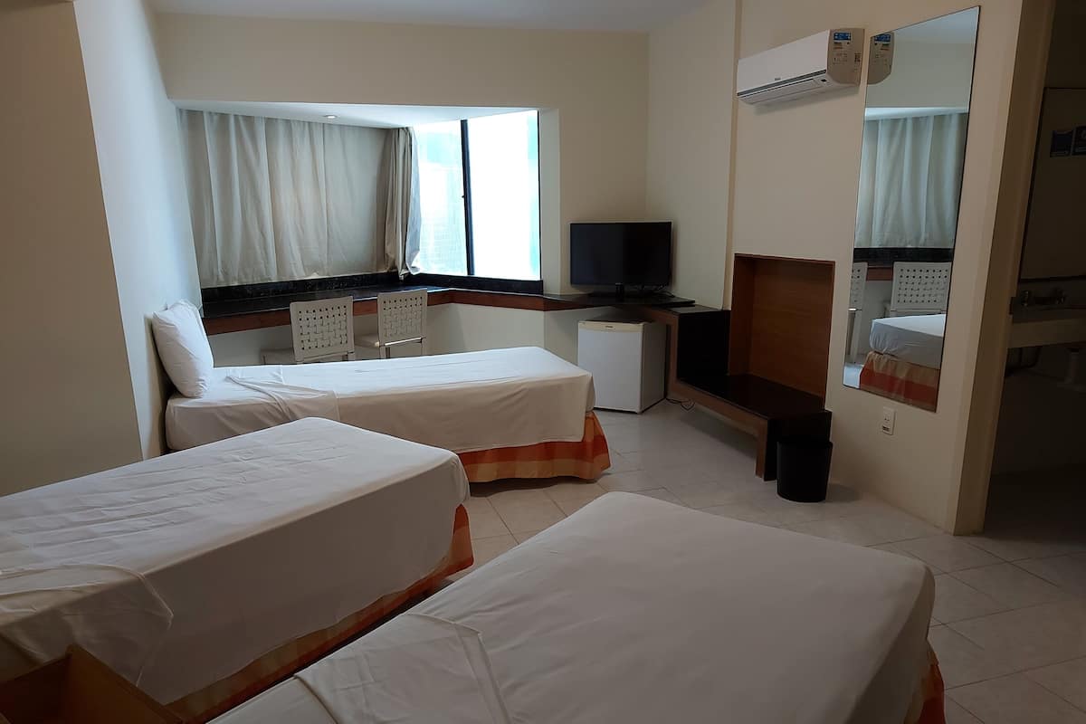 Standard Triple Room | Minibar, in-room safe, desk, free cribs/infant beds