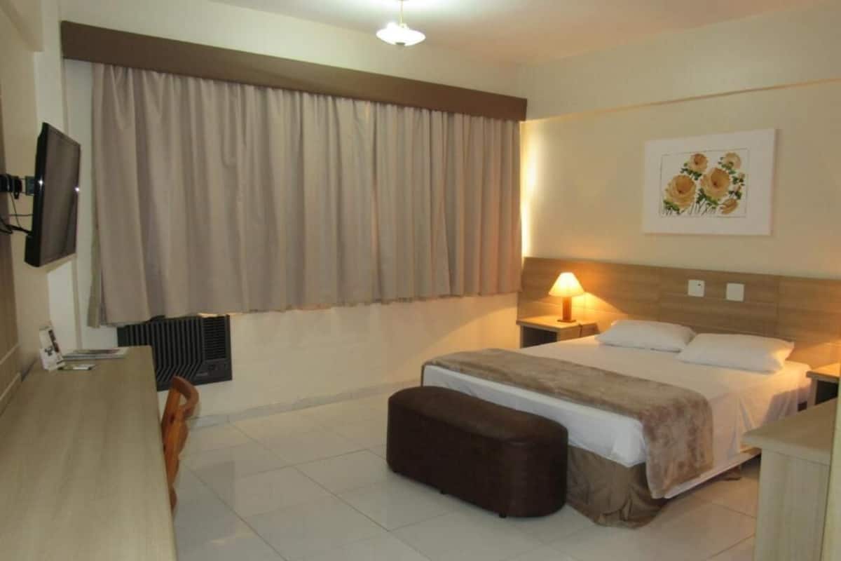 Suíte | Frigobar, cofres nos quartos, Wi-Fi de cortesia, roupa de cama