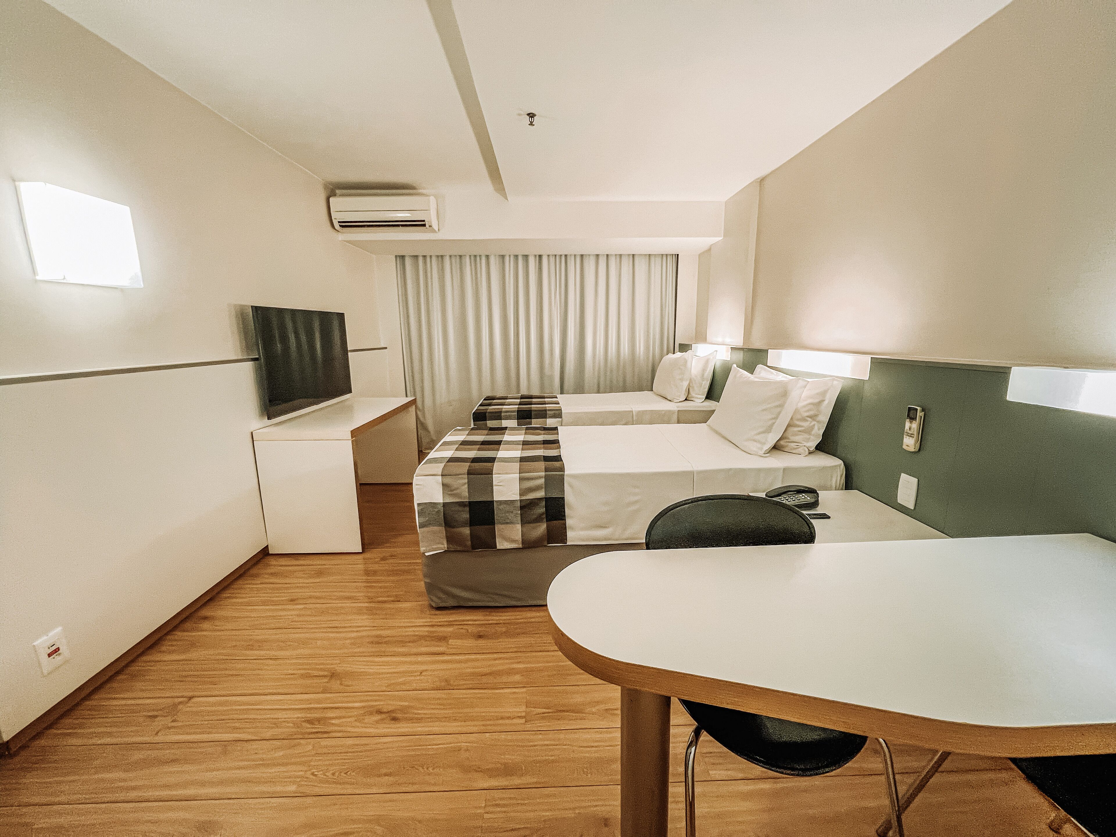 standard single room | in-room safe, desk, blackout curtains, free wifi