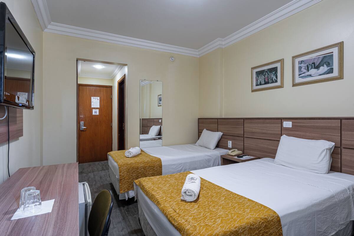 Premium bedding, down comforters, pillowtop beds, minibar