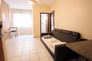 Deluxe Apartment | Living room | LCD TV