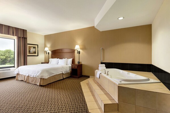 Room, 1 King Bed, Accessible, Non Smoking | Bathroom | Combined shower/tub, rainfall showerhead, hair dryer, towels