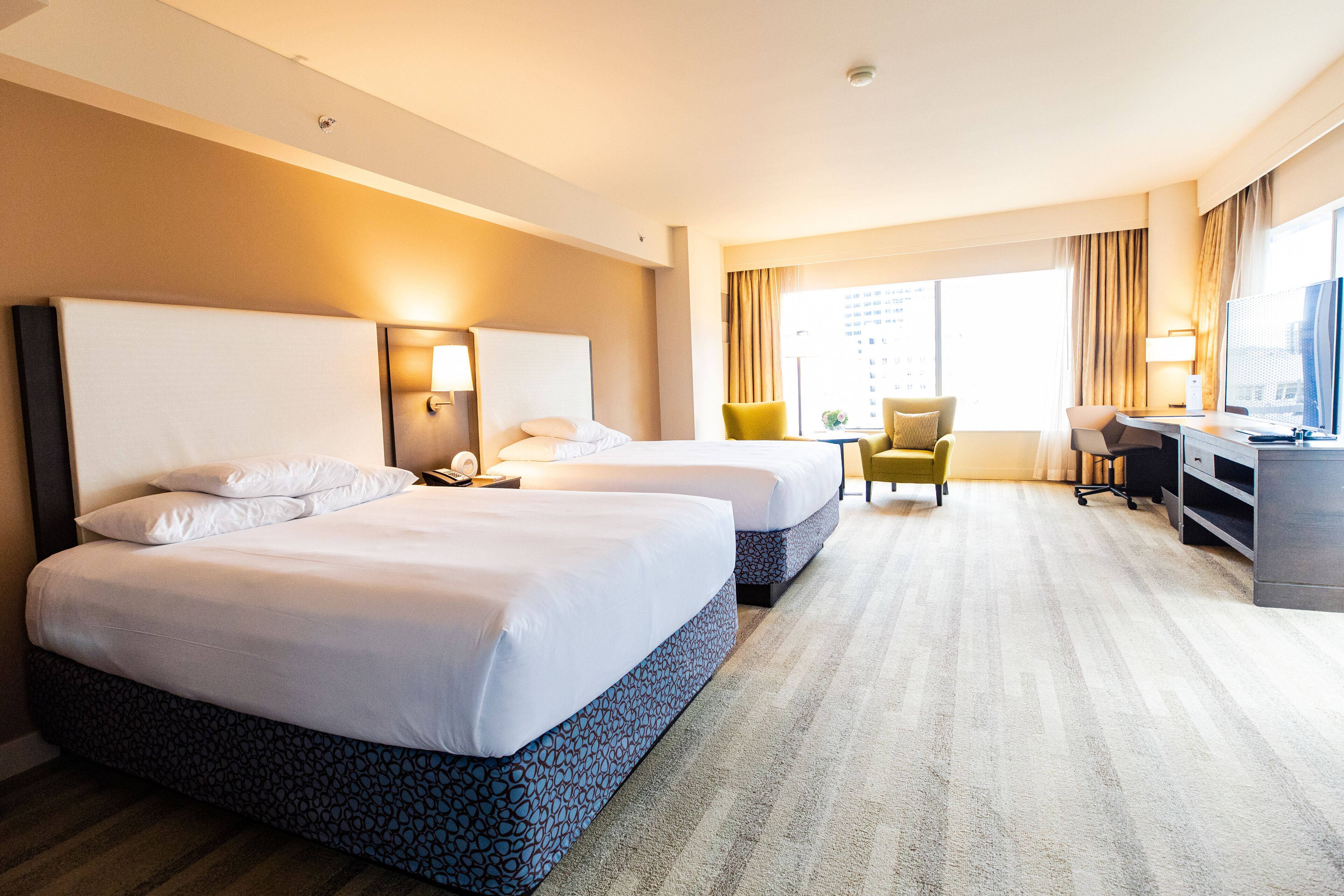 deluxe room, 2 queen beds | premium bedding, pillow-top beds, in-room safe, desk