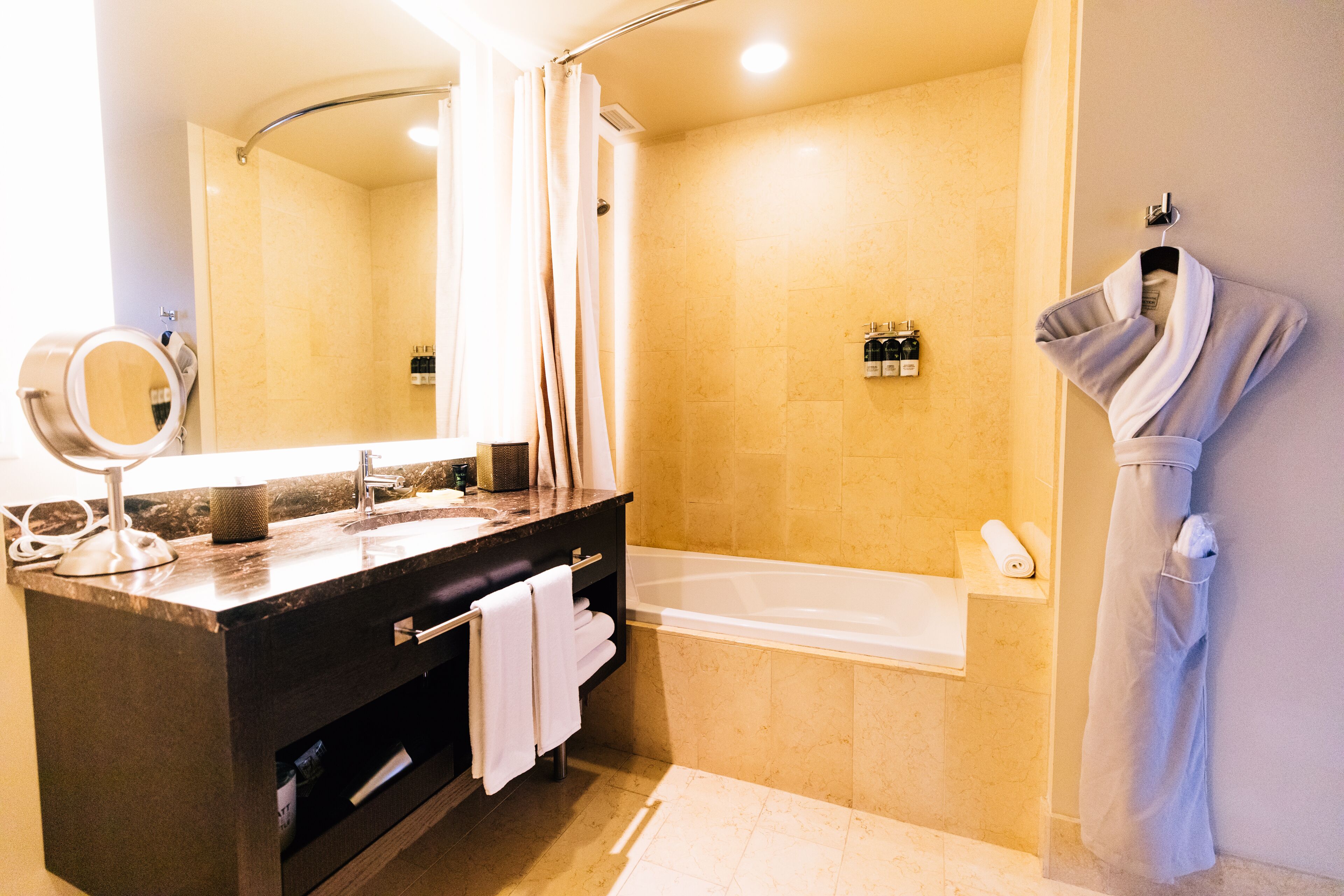 deluxe room, 2 queen beds | bathroom | designer toiletries, hair dryer, bathrobes, towels