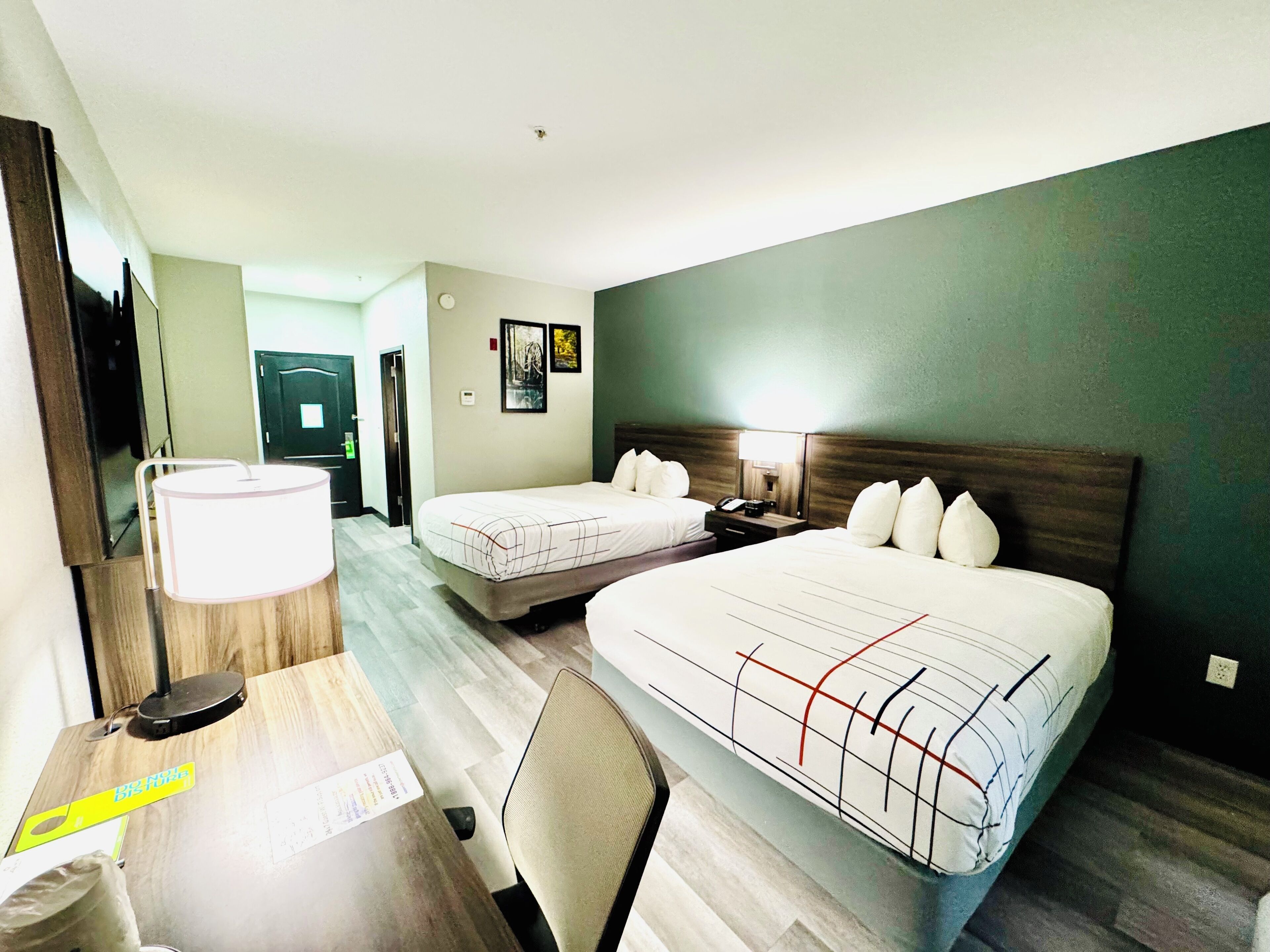 Premium bedding, pillow-top beds, desk, blackout curtains