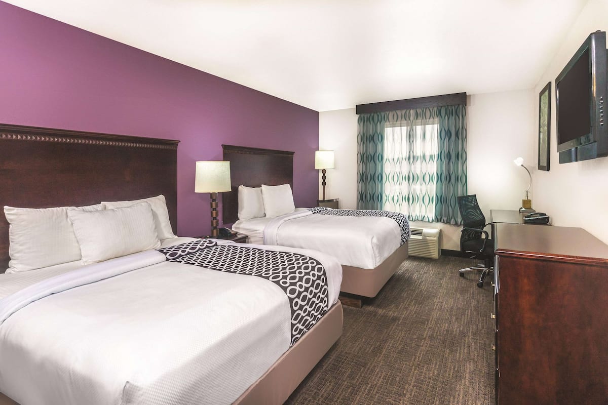 Premium bedding, pillowtop beds, desk, blackout drapes