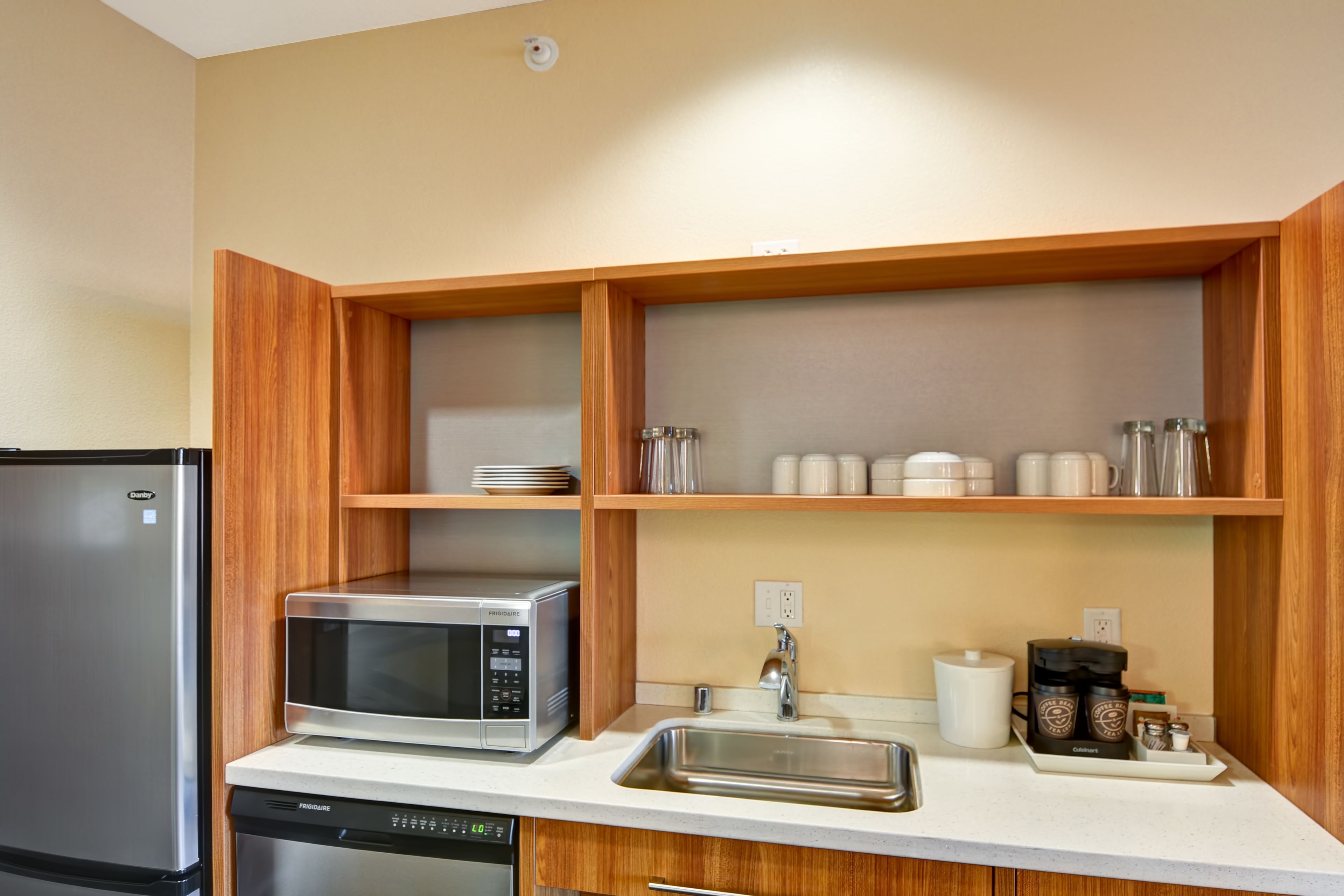 full-sized fridge, microwave, dishwasher, coffee/tea maker