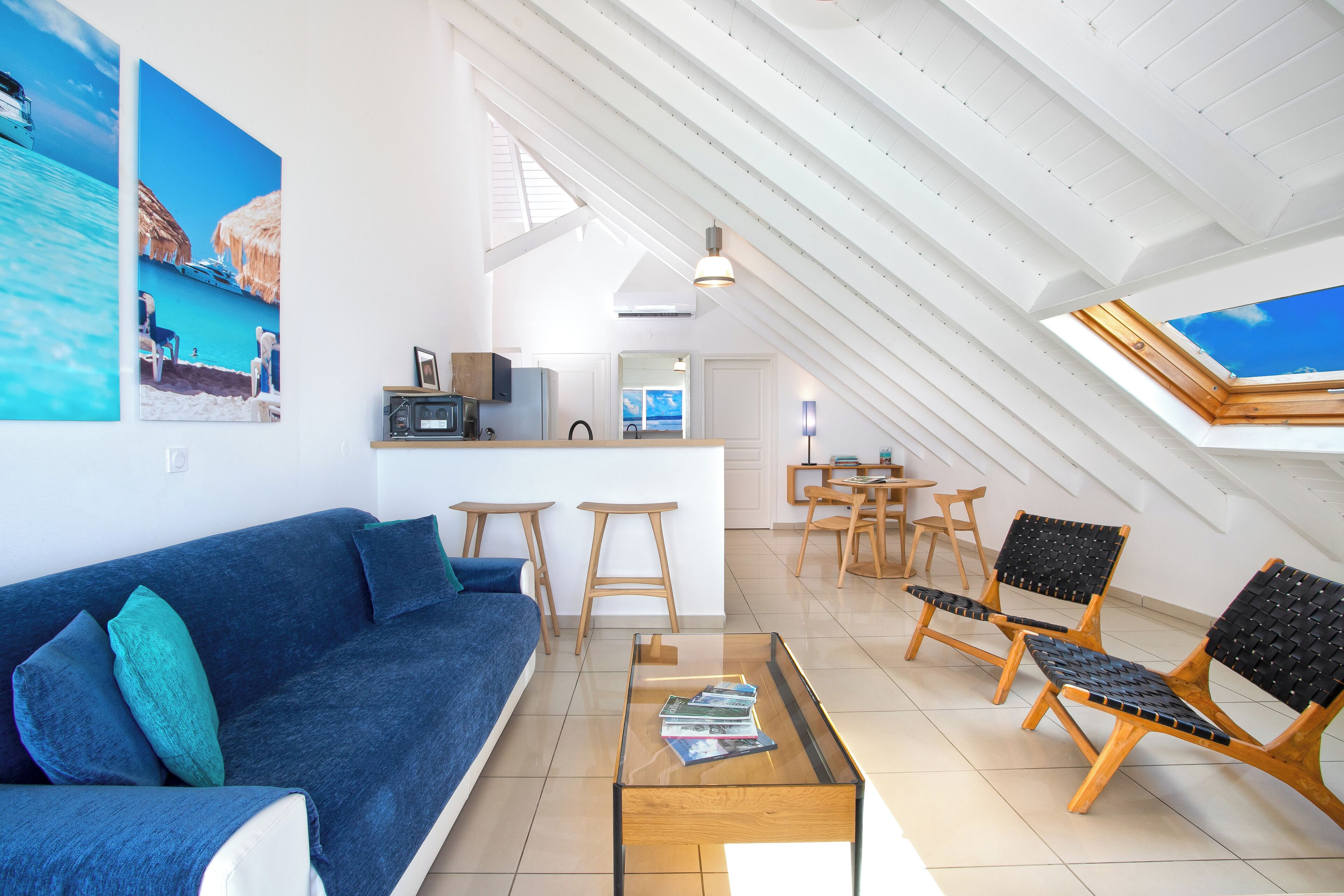 standard apartment | living area | 54-inch flat-screen tv with premium tv channels, tv, ipod dock