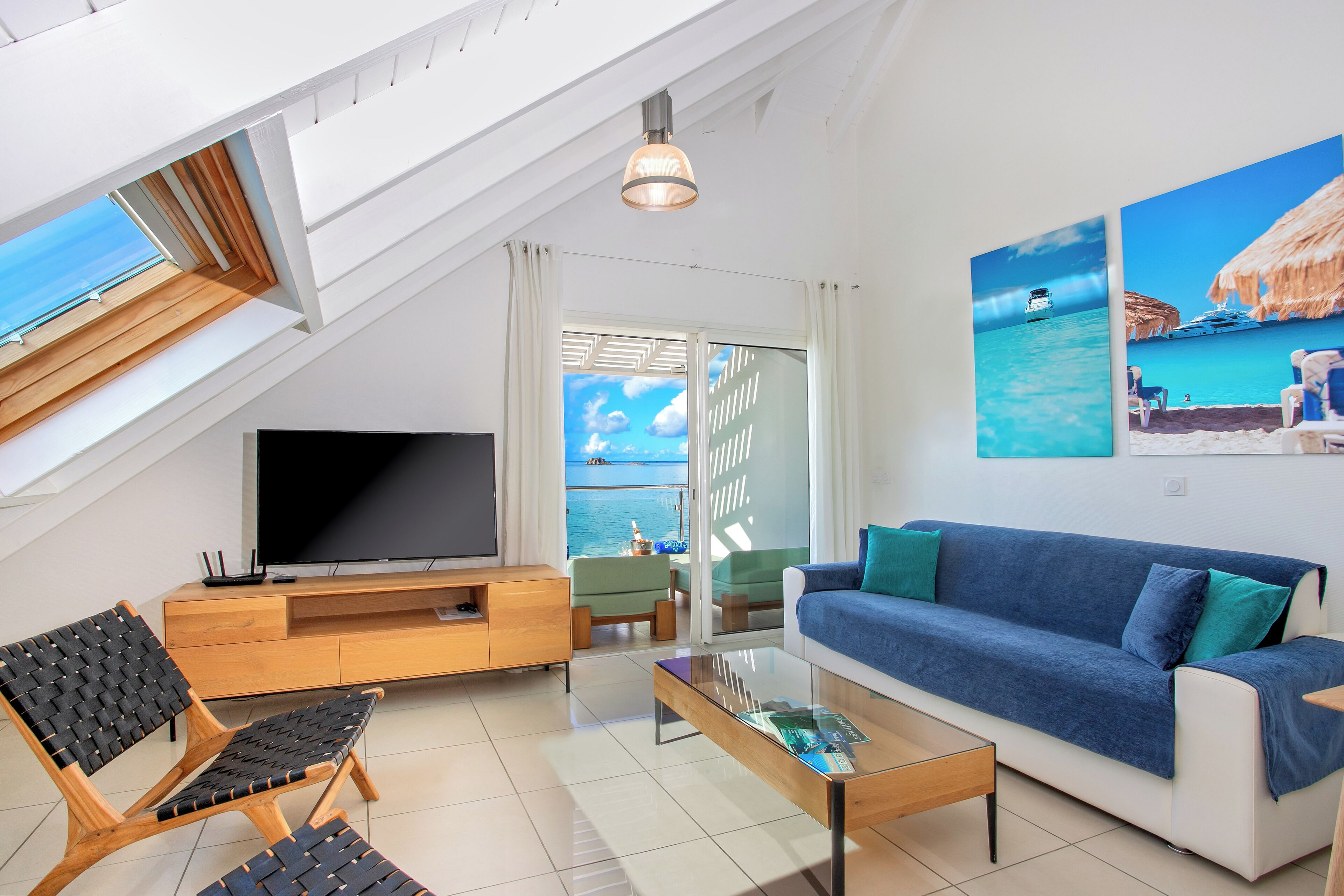 standard apartment | living area | 54-inch flat-screen tv with premium tv channels, tv, ipod dock