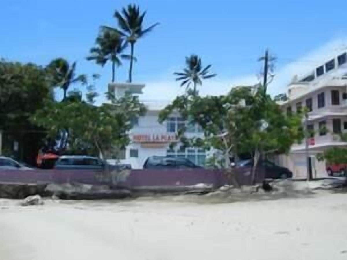 on the beach, white sand, beach towels