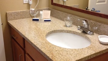 Designer toiletries, hair dryer, towels, soap
