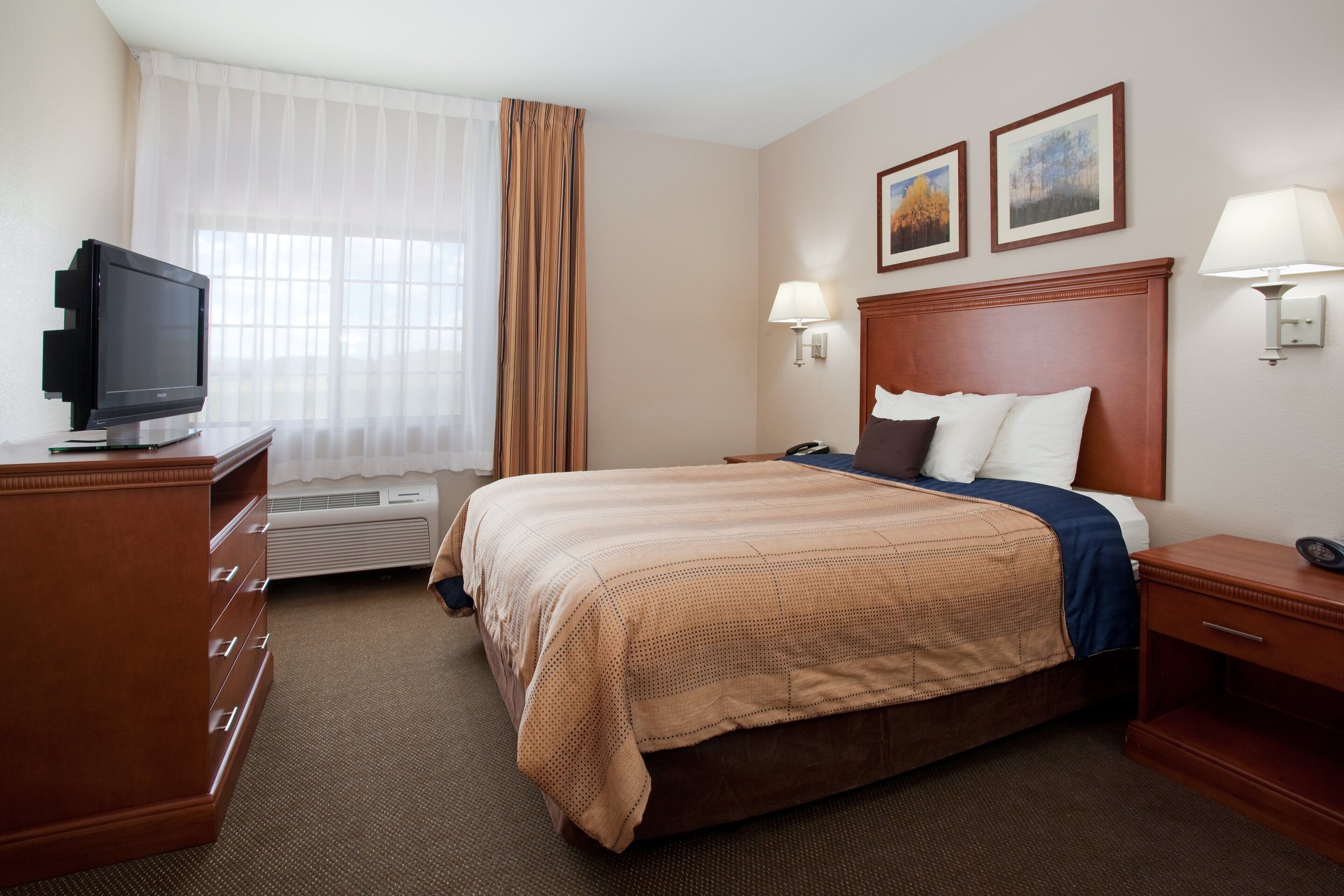 Premium bedding, pillow-top beds, desk, laptop workspace