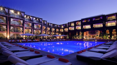 Indoor pool, outdoor pool, pool umbrellas