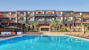 Indoor pool, outdoor pool, pool umbrellas