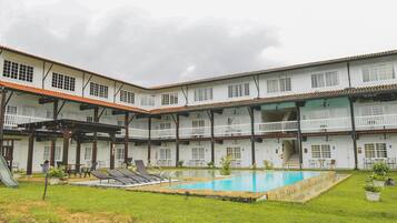 Outdoor pool, open 8:00 AM to 8:00 PM, free pool cabanas, pool loungers