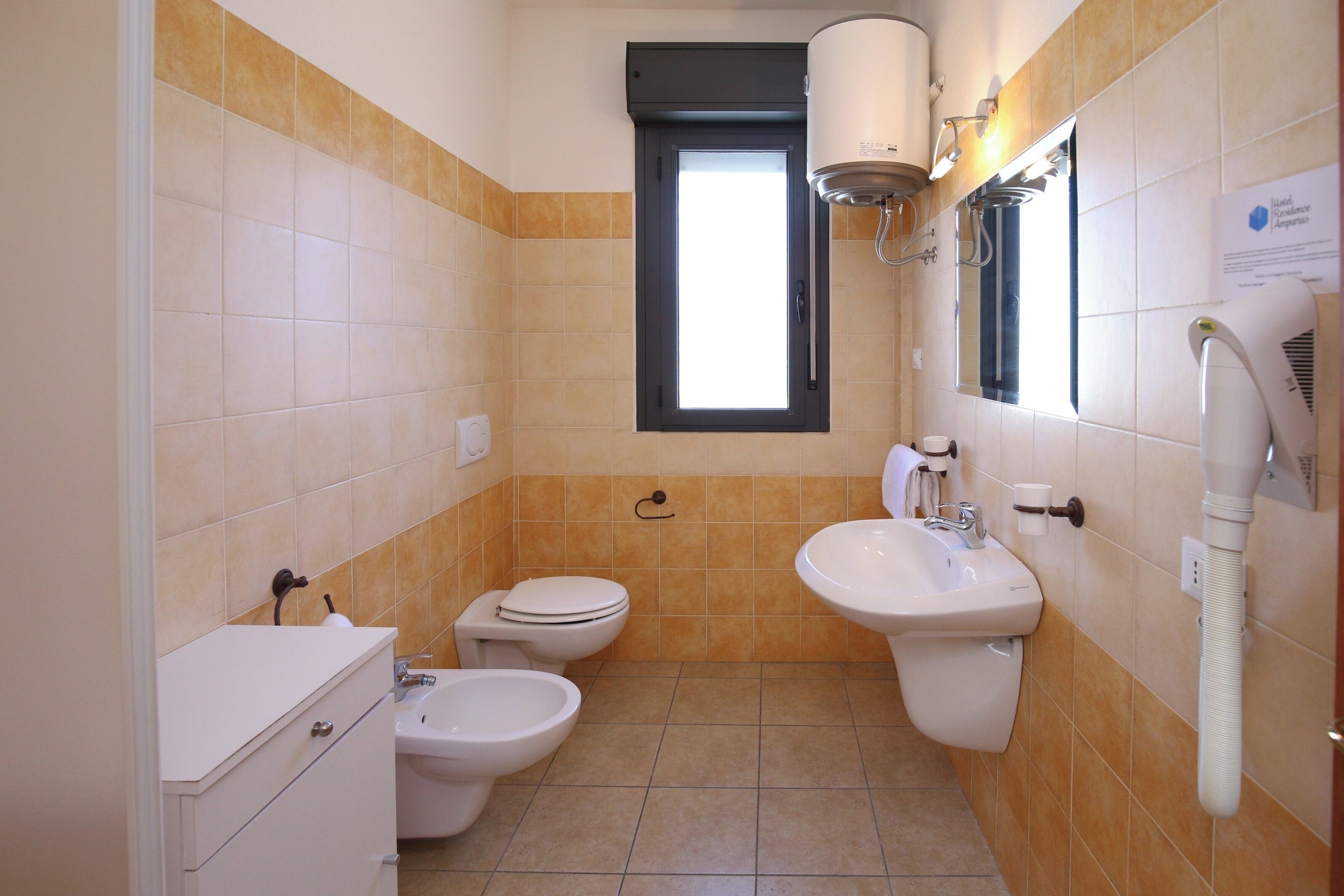 standard triple room | bathroom | shower, bidet, towels