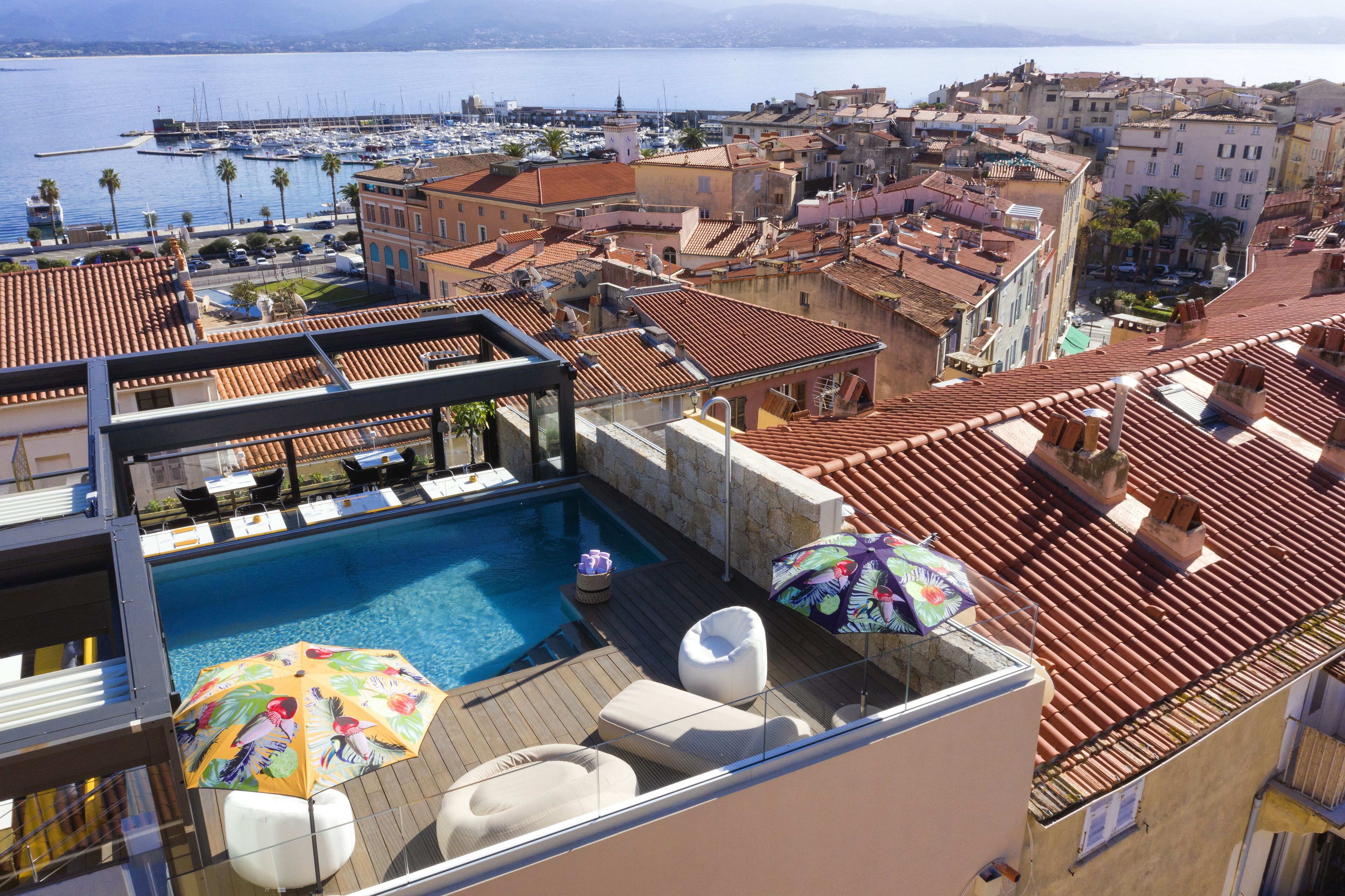 seasonal outdoor pool, open 8:30 am to 6:30 pm, pool umbrellas