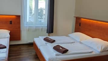 Triple Room, Private Bathroom | Desk, blackout drapes, free WiFi, bed sheets