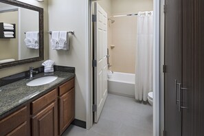 A bathroom with a sink, mirror, and shower. - Staybridge Suites Austin NW by IHG (Austin)