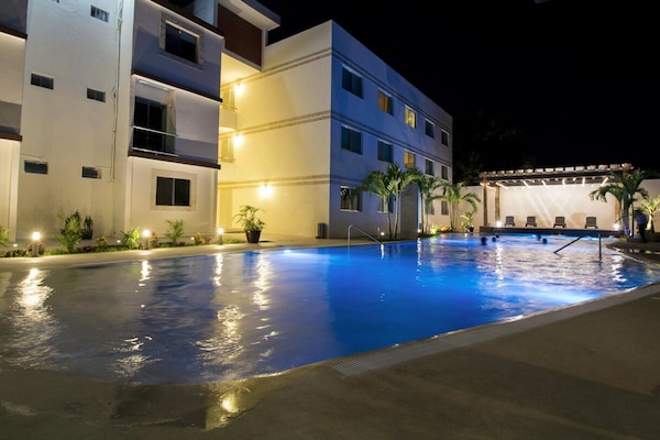 Outdoor pool, open 9 AM to 10 PM, free pool cabanas, pool umbrellas