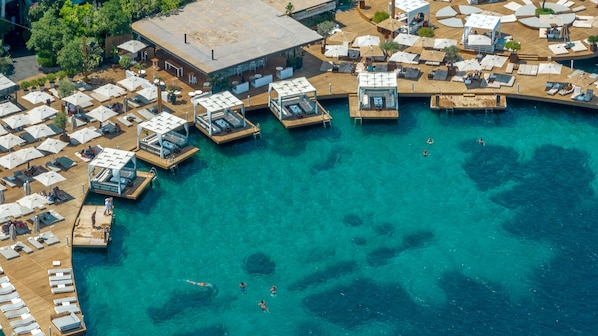 On the beach, sun loungers, beach umbrellas, beach towels