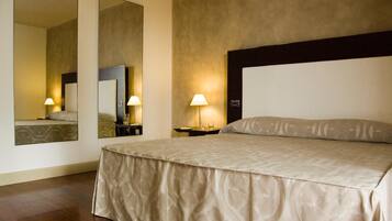 Suíte júnior | Frigobar, cofres nos quartos, escrivaninha