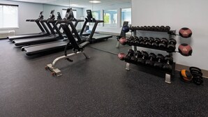A gym with treadmills, dumbbells, and exercise balls. - Holiday Inn Express & Suites Meriden by IHG (Meriden)