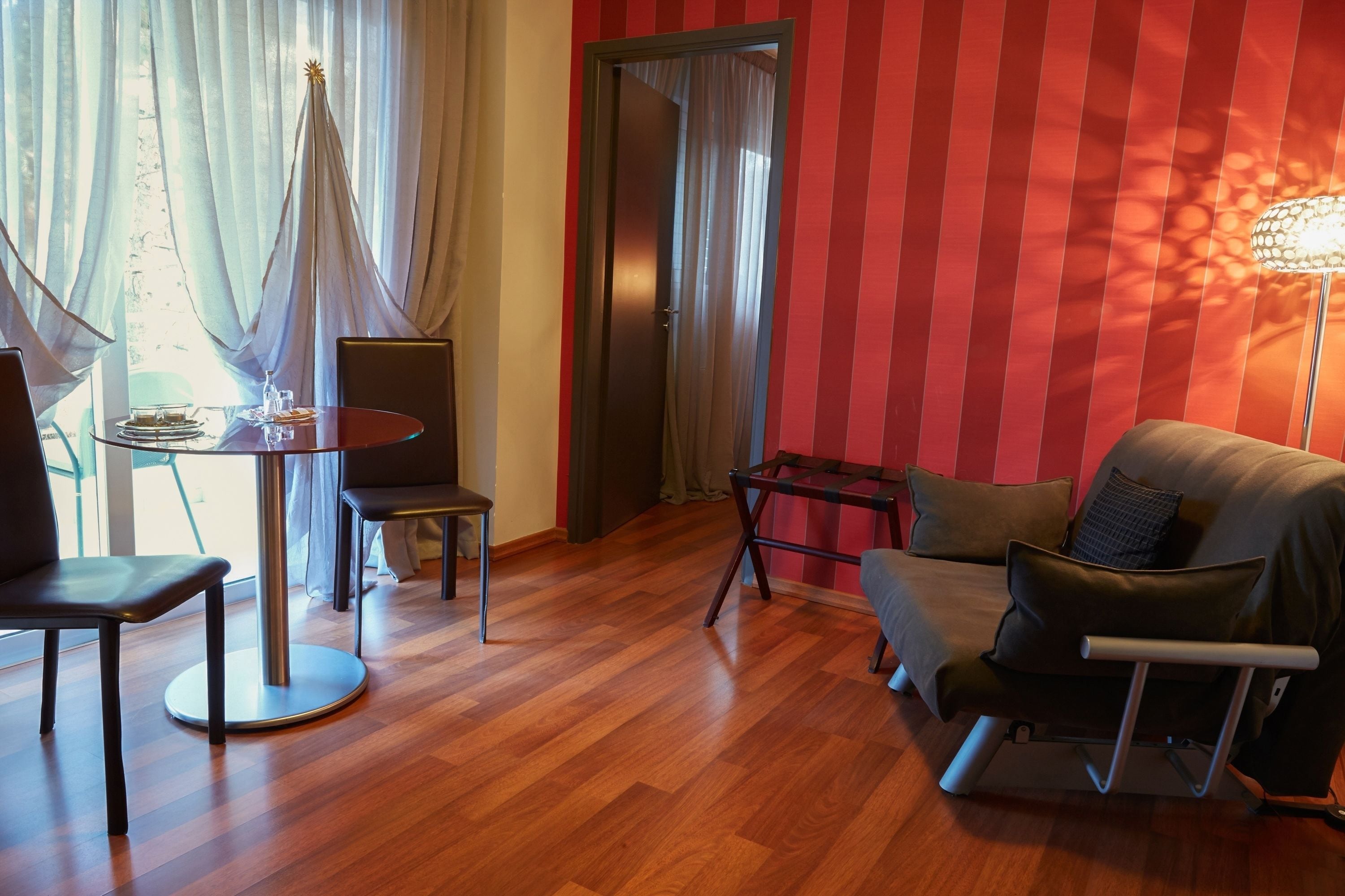 superior double or twin room | living area | lcd tv