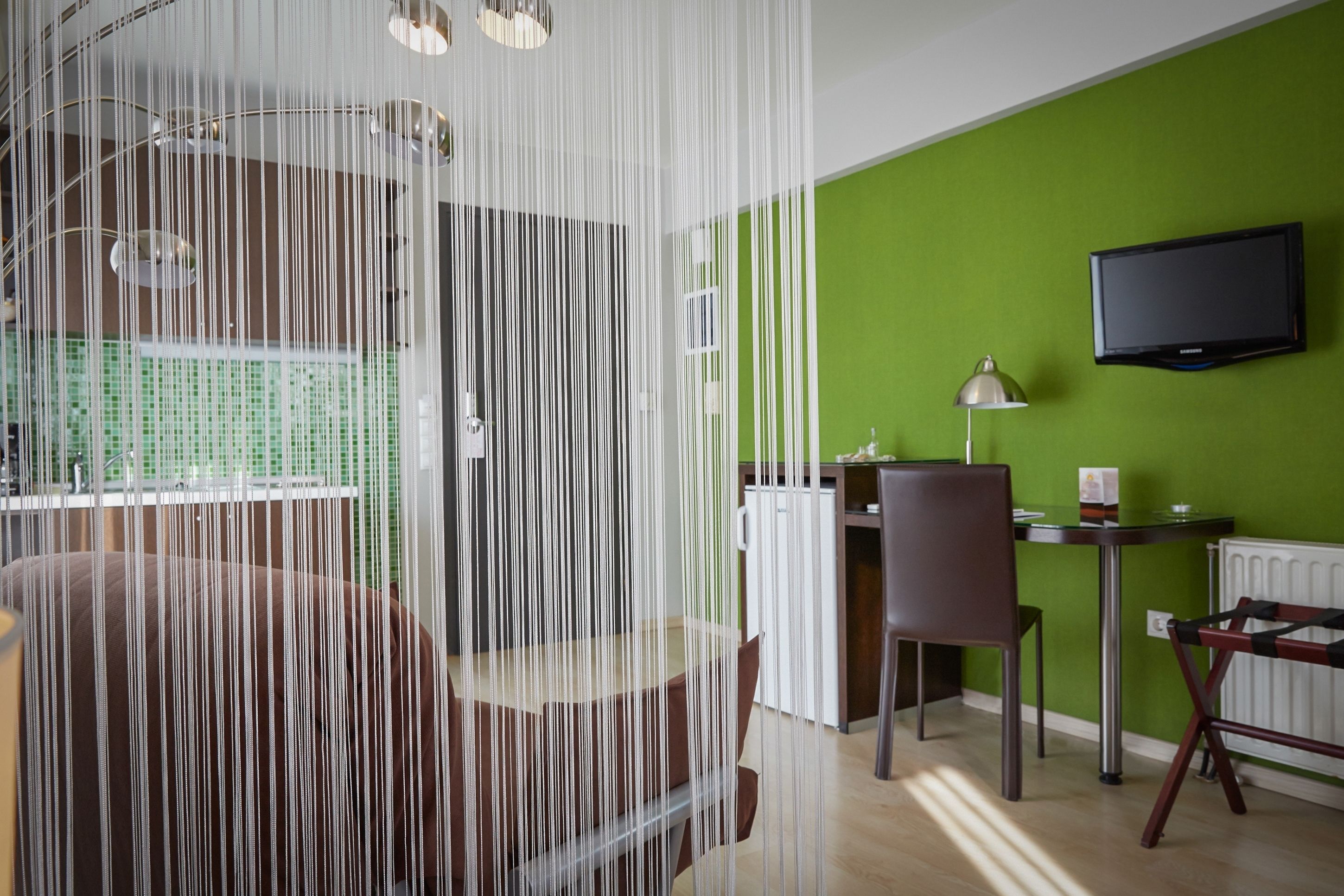 superior double or twin room | living area | lcd tv