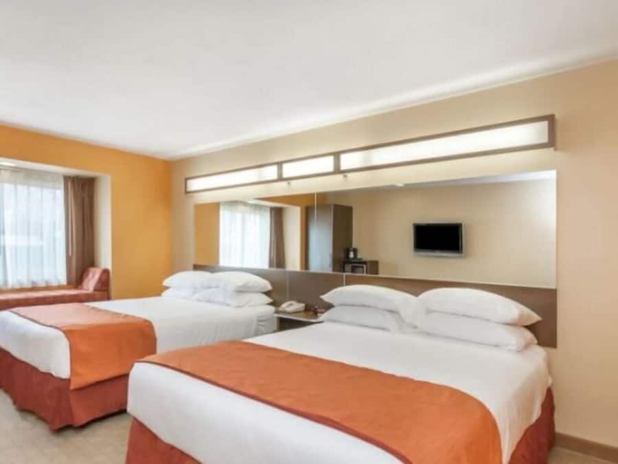 Premium bedding, pillow-top beds, in-room safe, desk