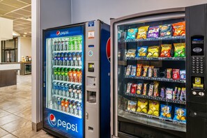 Vending machines with Pepsi and various snacks.