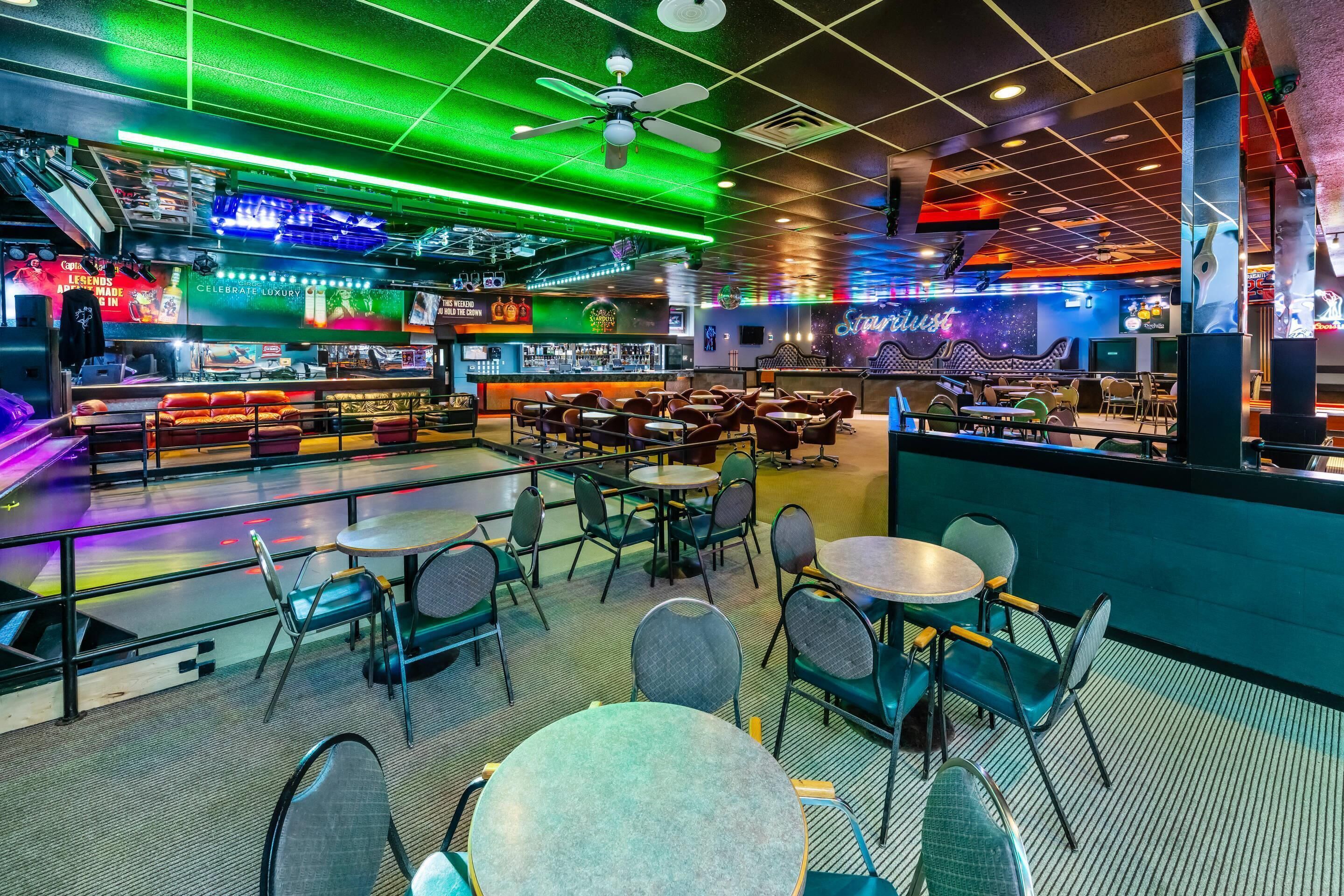 A bar area with seating and a bar counter.